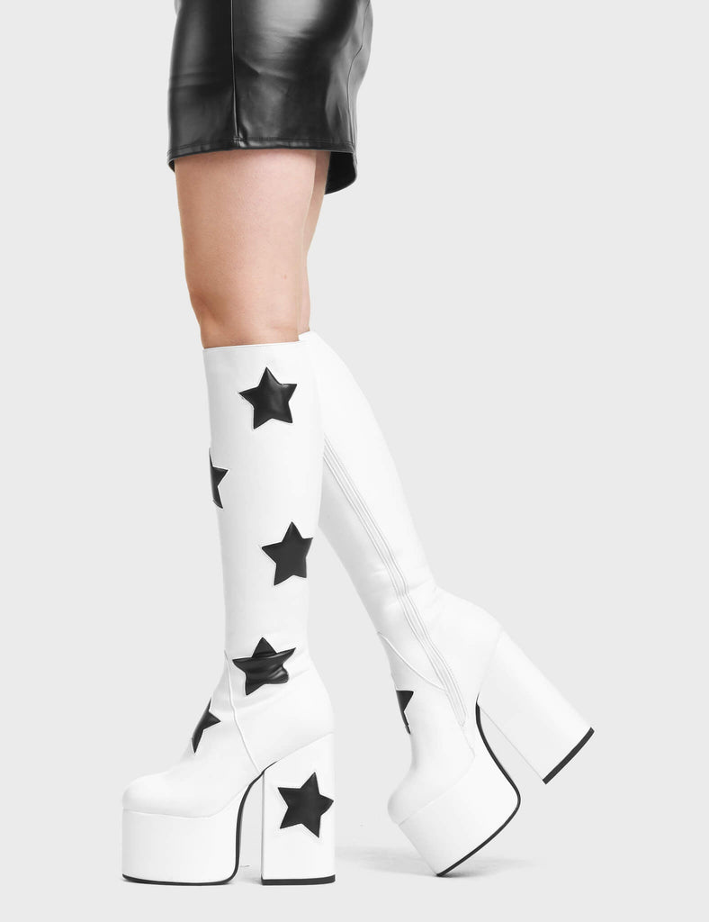 Comet Platform Knee High Boots in White. These Platform Knee High Boots feature Black Stars.