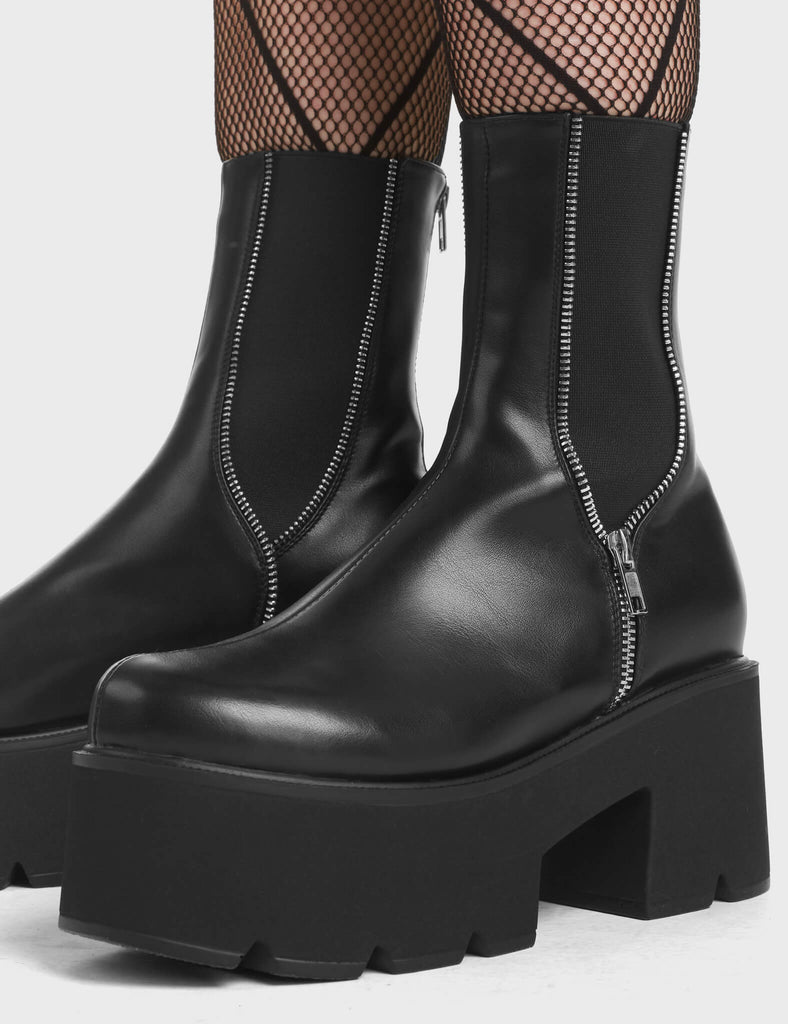 Dilemma Chunky Platform Ankle Boots in Black. Feature an elastic gusset with silver zip detailing.