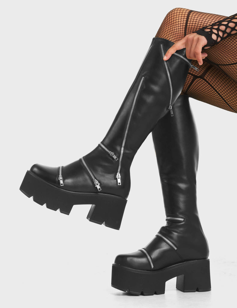 Go Figure Chunky Platform Knee High Boots in Black. Feature silver zip detailing on a chunky platform sole.