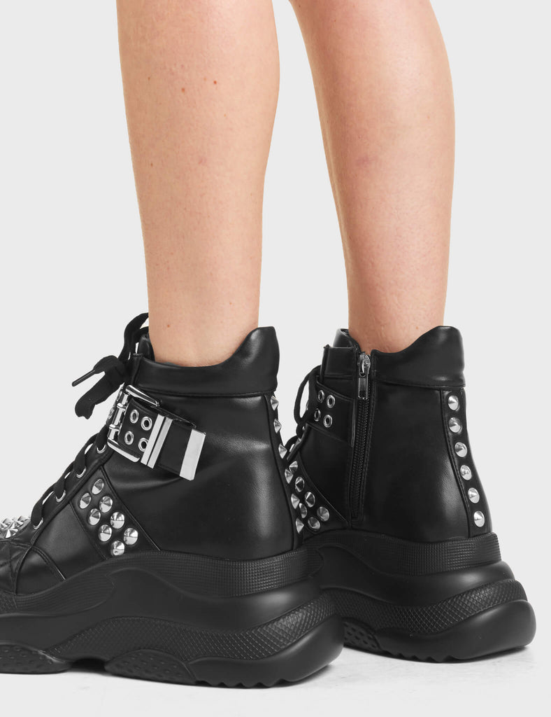 Lost It All Chunky Platform Sneakers in Black. Feature large square silver buckle and silver studs.