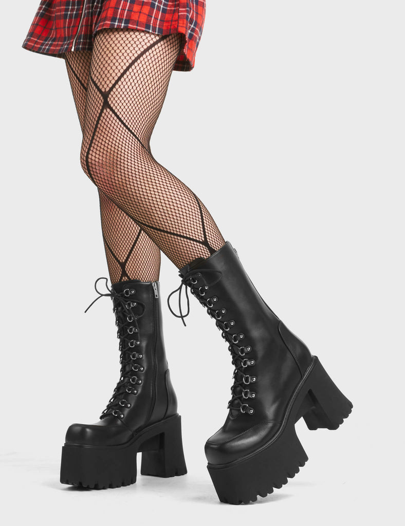 Need You Chunky Platform Calf Boots in Black. Feature a lace-up design and a functional zip.