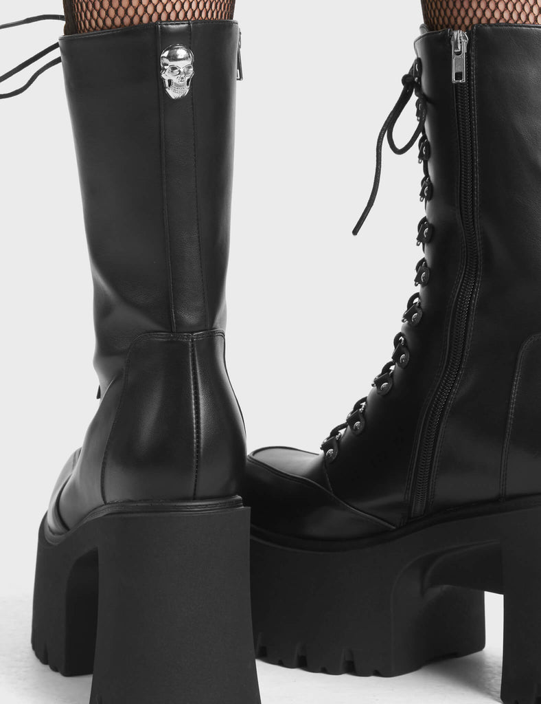 Need You Chunky Platform Calf Boots in Black. Feature a lace-up design and a functional zip.