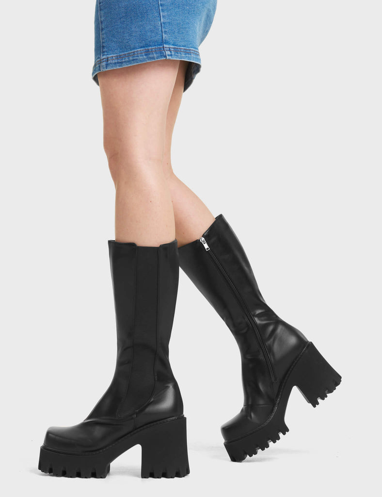 Paradise Chunky Platform Calf Boots in Black. Which feature a stretchy elastic gusset. Made with eco-friendly materials and 100% cruelty-free.