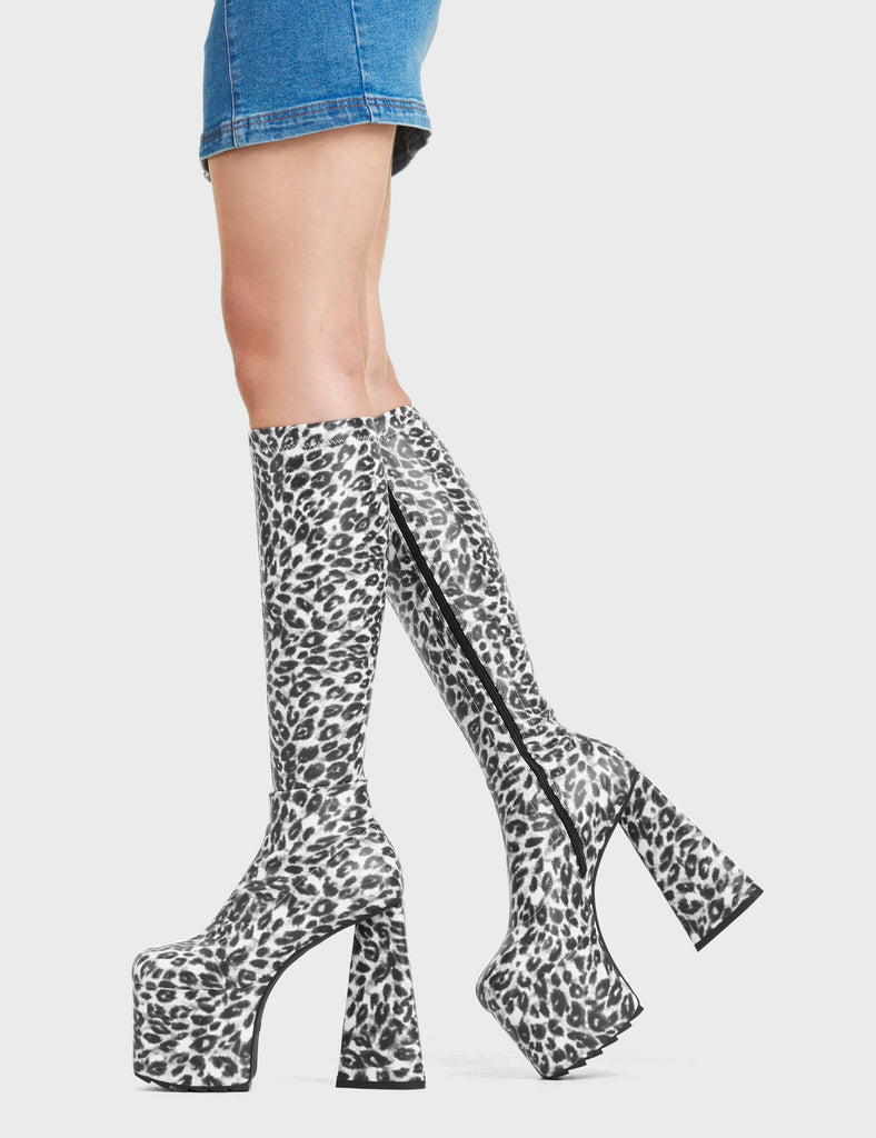 Smokeshow Platform Knee High Boots feature a leopard print design, on our platform sole and heart shaped heel.